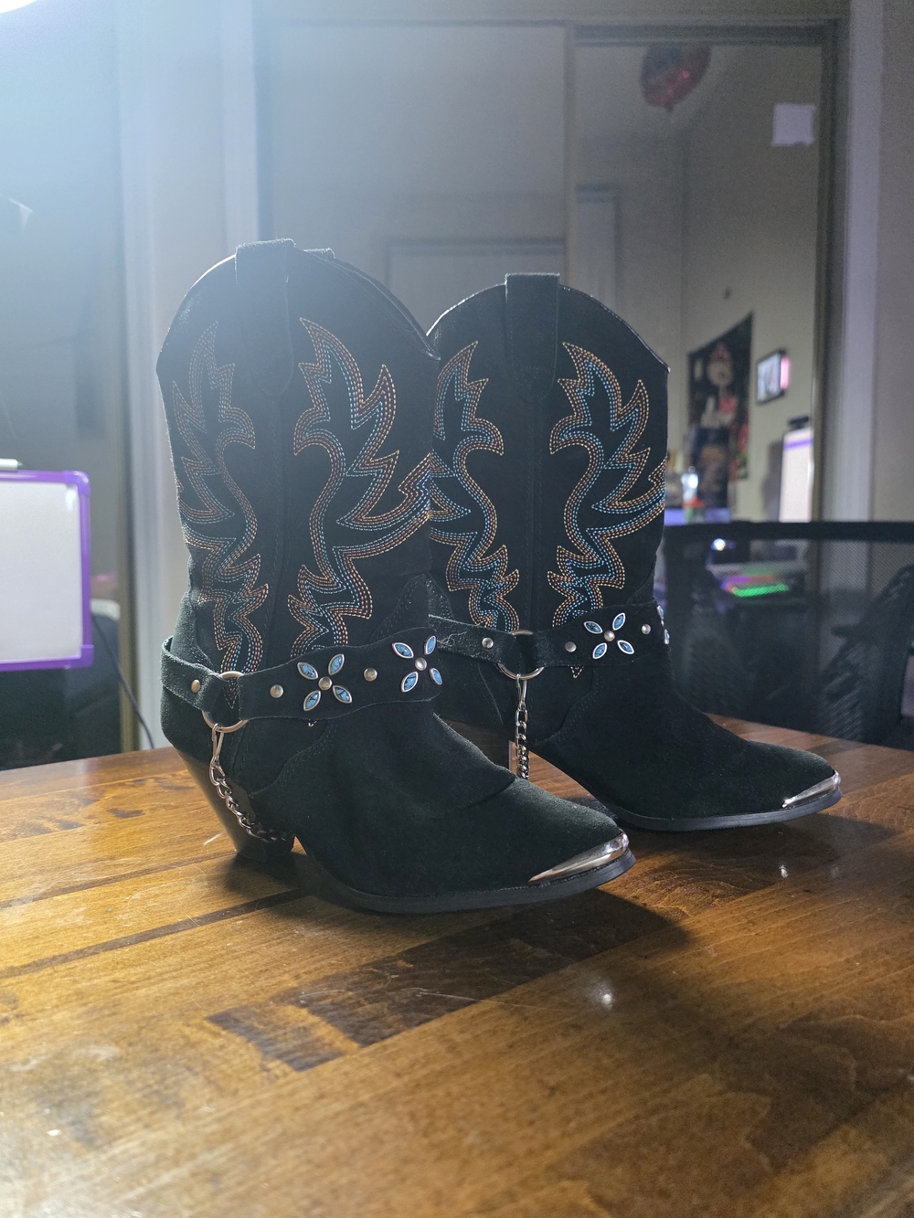 Western-Inspired Black Suede Cowboy Boots with Silver Accents